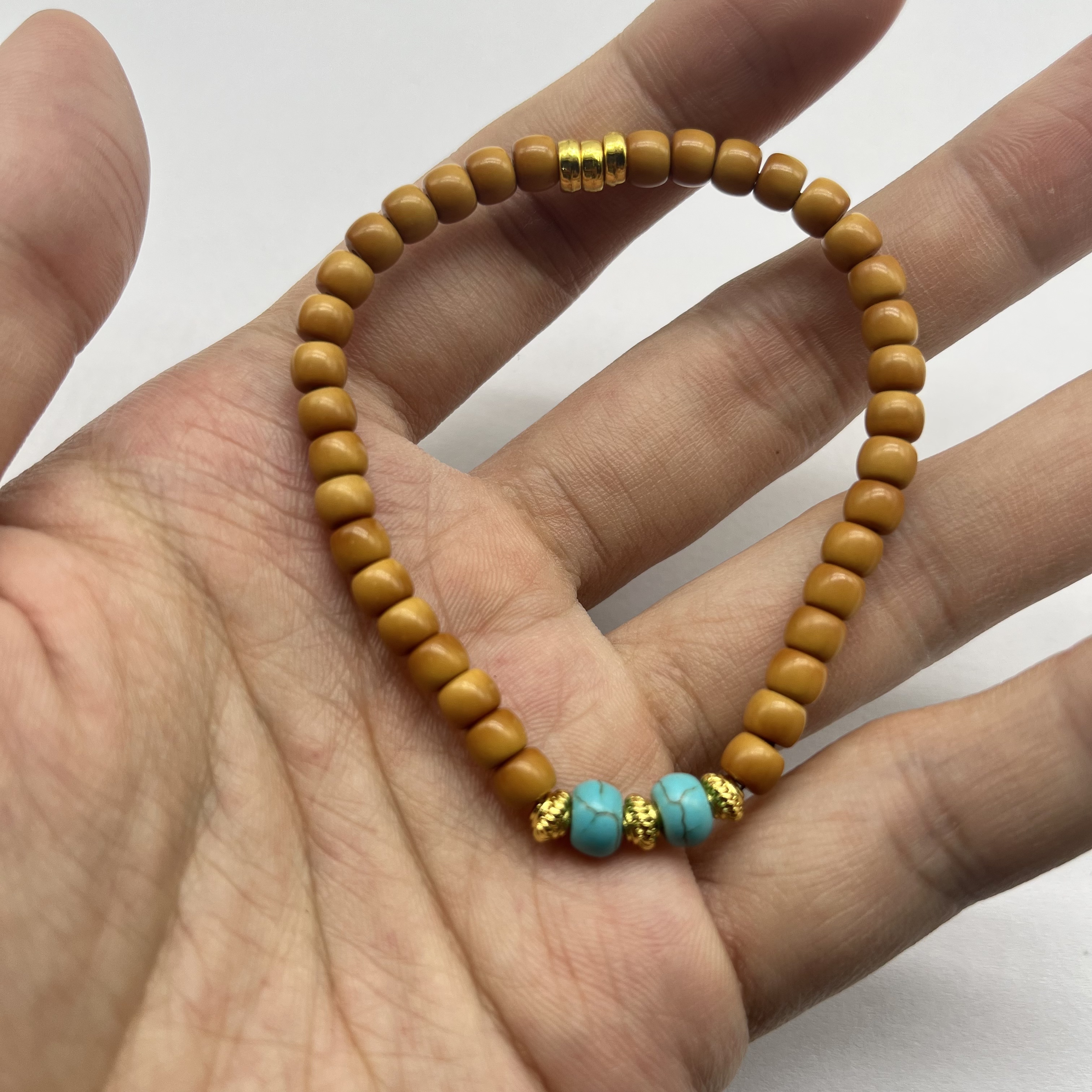 A1 橄榄核尖直切单圈手串卡4*5 A590 （配A1礼盒）