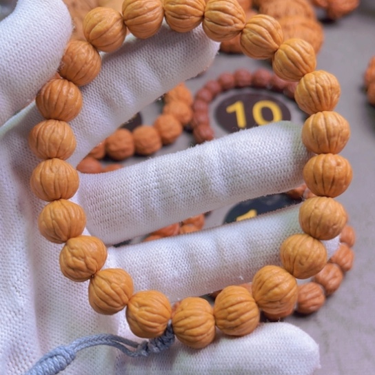 文玩核桃吊坠猴头手串