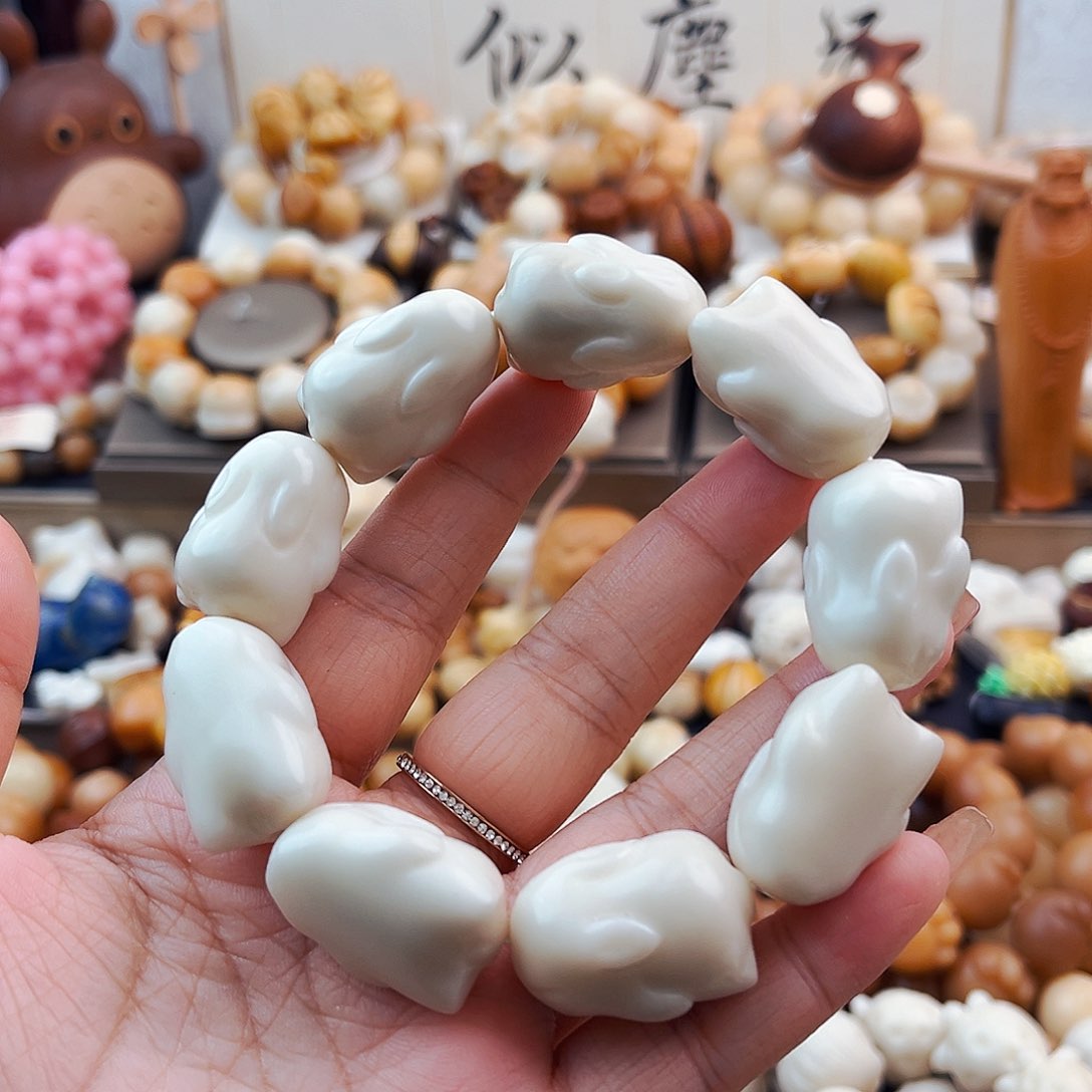 菩提根/象牙果手串飞天兔小