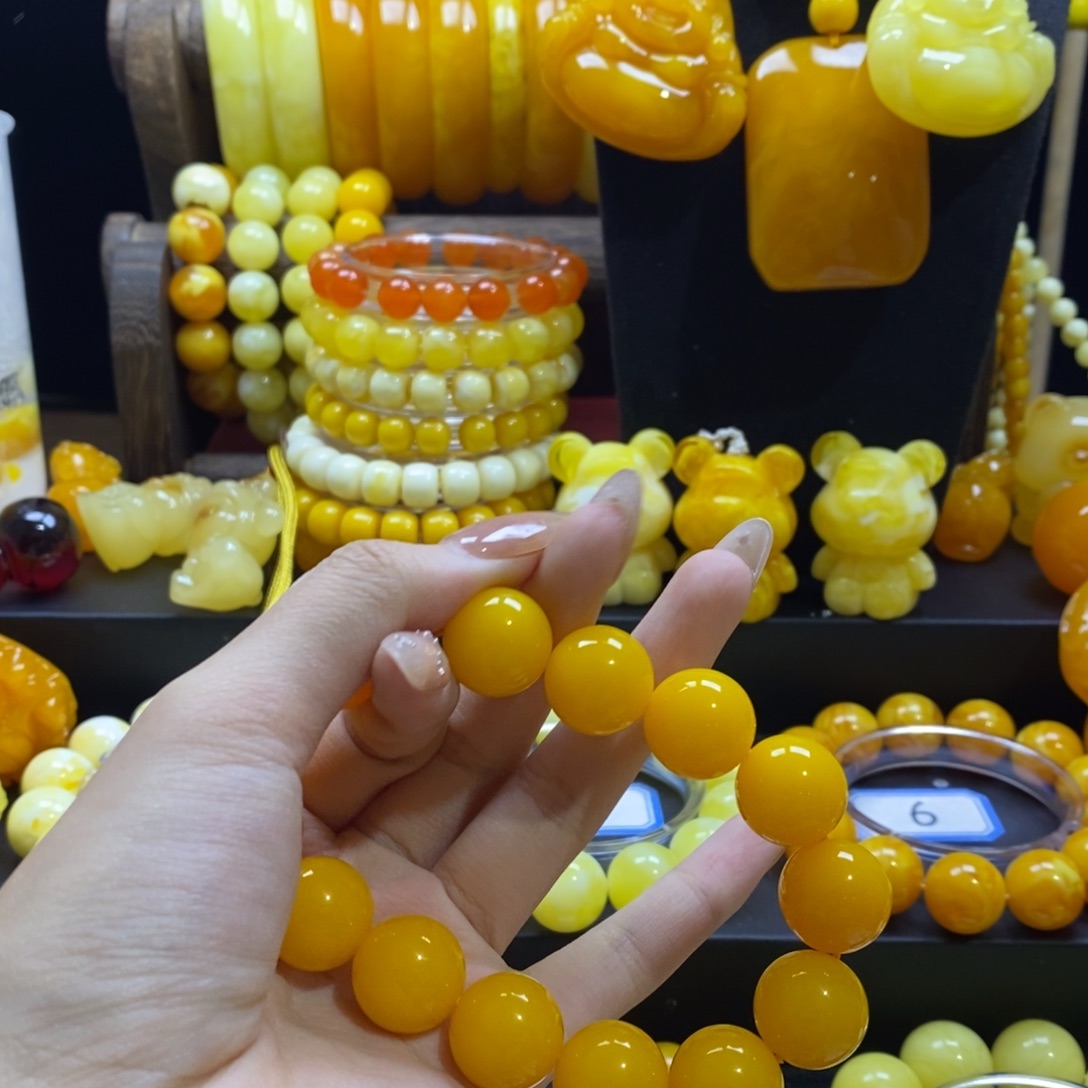 张***板非金属全品无暇鸡油黄手串