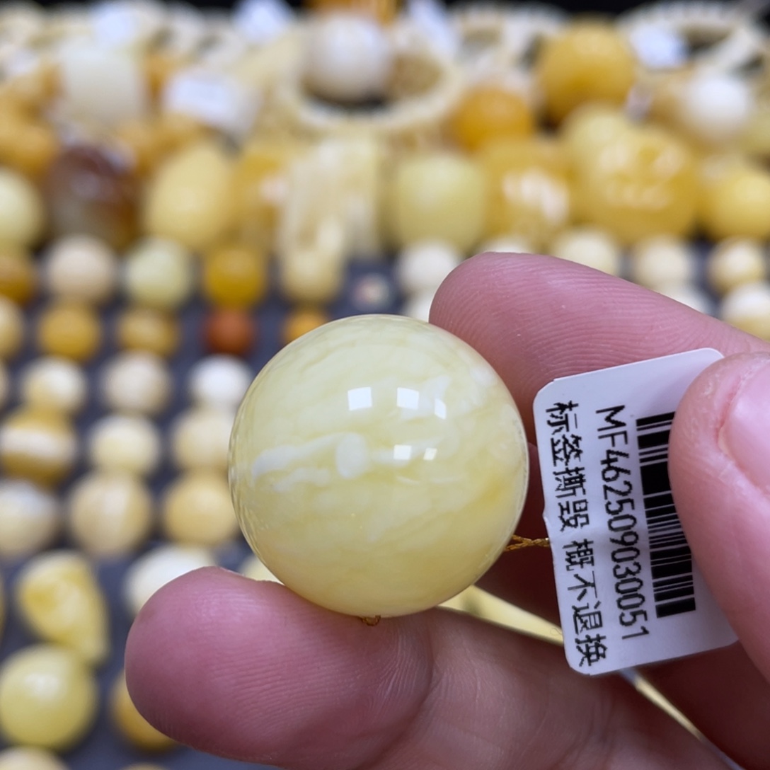 蜜蜡未镶嵌裸石21.9mm虎皮妖花