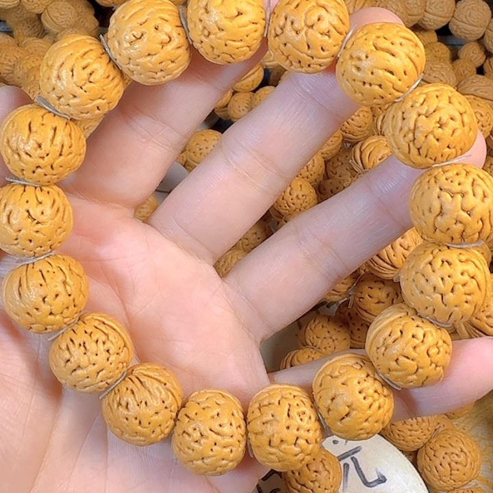 用***0吊坠桃核18盘锦奶豆桃核