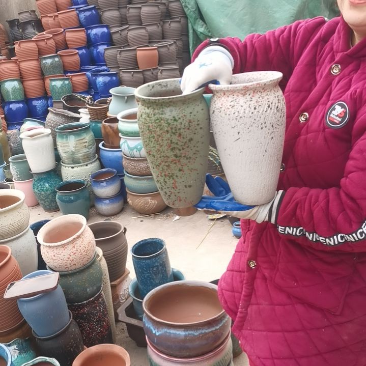 红陶口14高25瑕疵口变形扁了