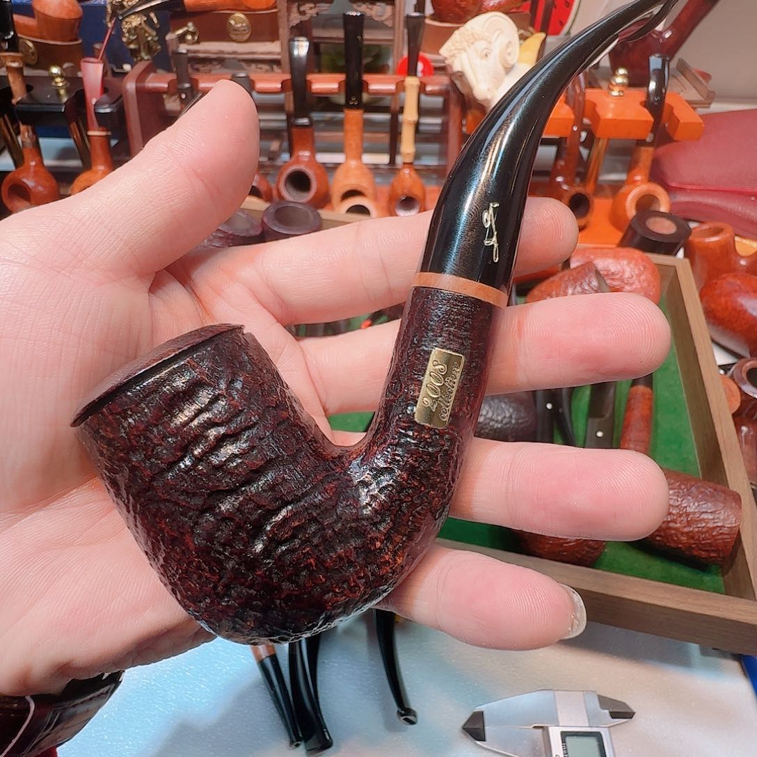 大***马沙芬，总裁，石楠木工艺品烟斗