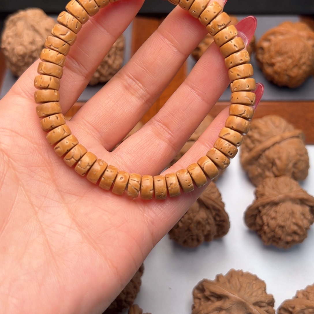 文玩核桃把件致**华核片串