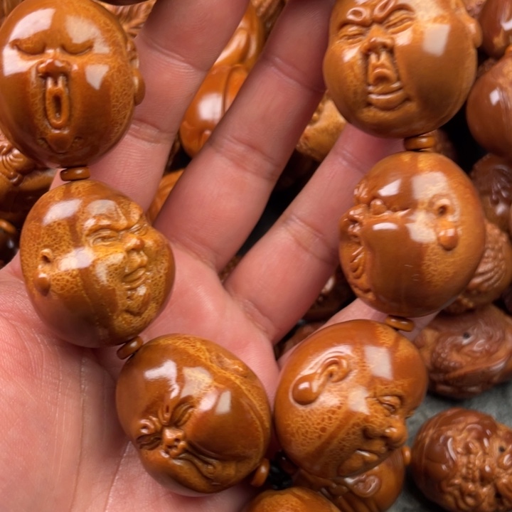 橄榄核手串情**旧橄榄核手持