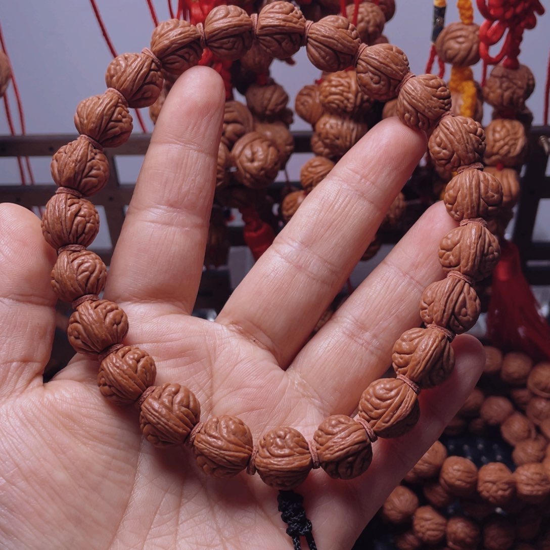 木质类龙纹桃枭手串