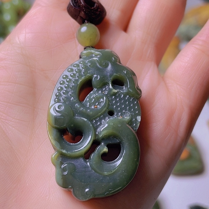 和田玉手把件未镶嵌