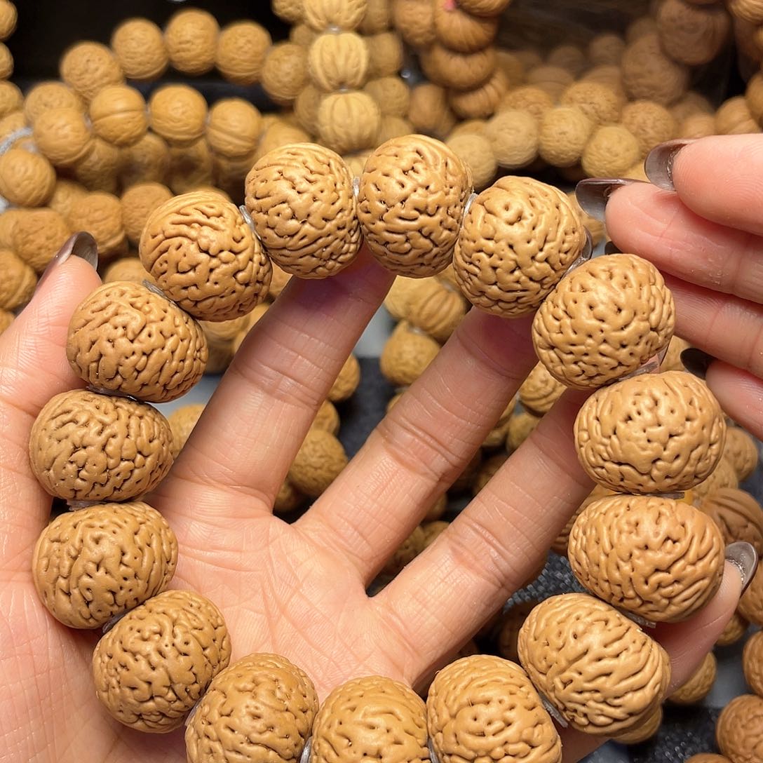 桃核手串21+磨盘手串