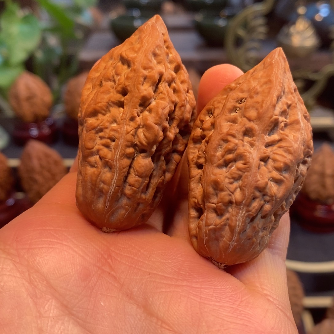 文玩核桃吊坠鬼脸