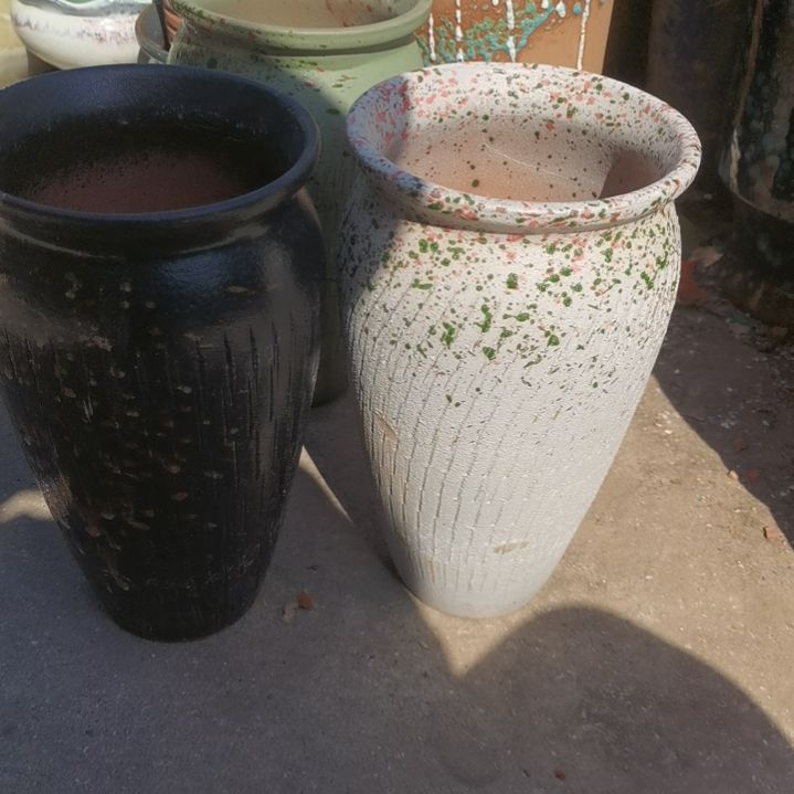 红陶口14高25瑕疵口变形扁了