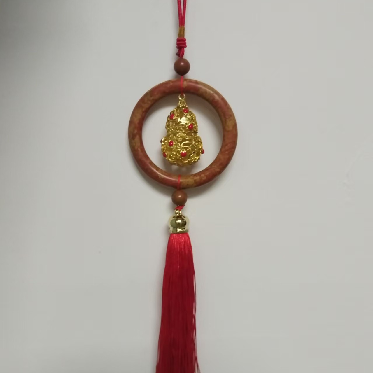 泗水康益砭石汽车挂件