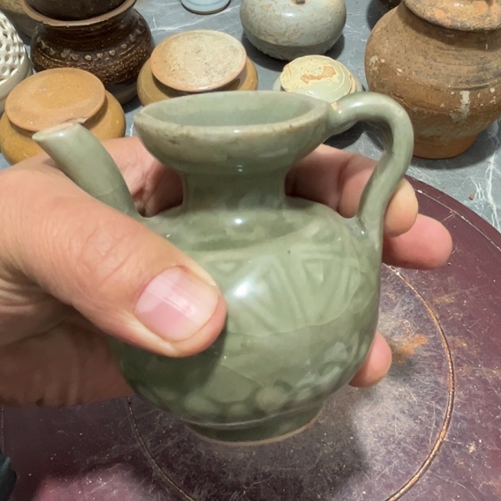 摆件陶良**筑一个断了扶饼的一把壶
