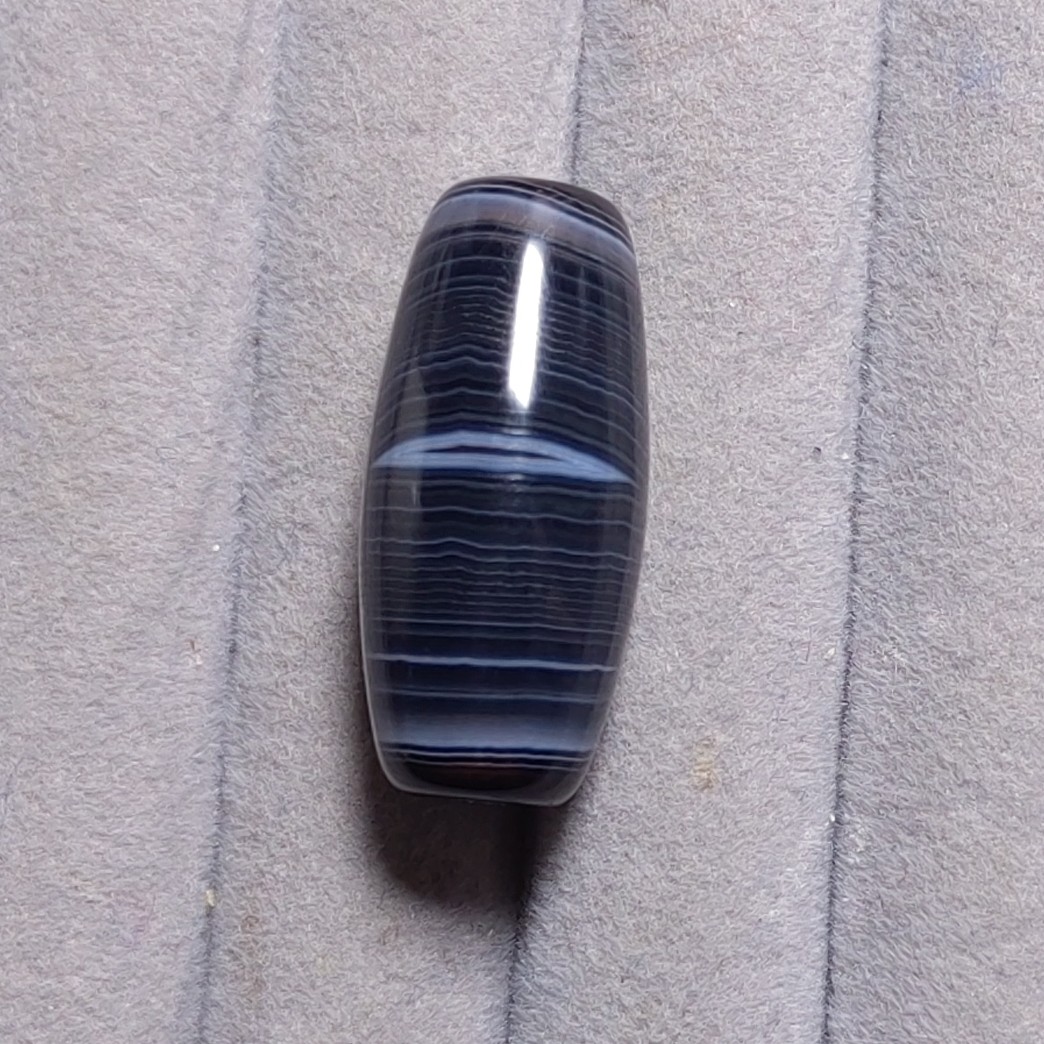缠丝玛瑙，小凤眼+缠丝线桶珠。尺寸约：31.7×14.4mm