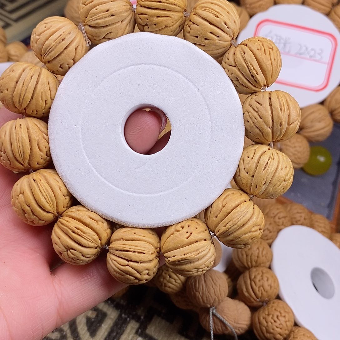 桃核手串随*国核滚象21