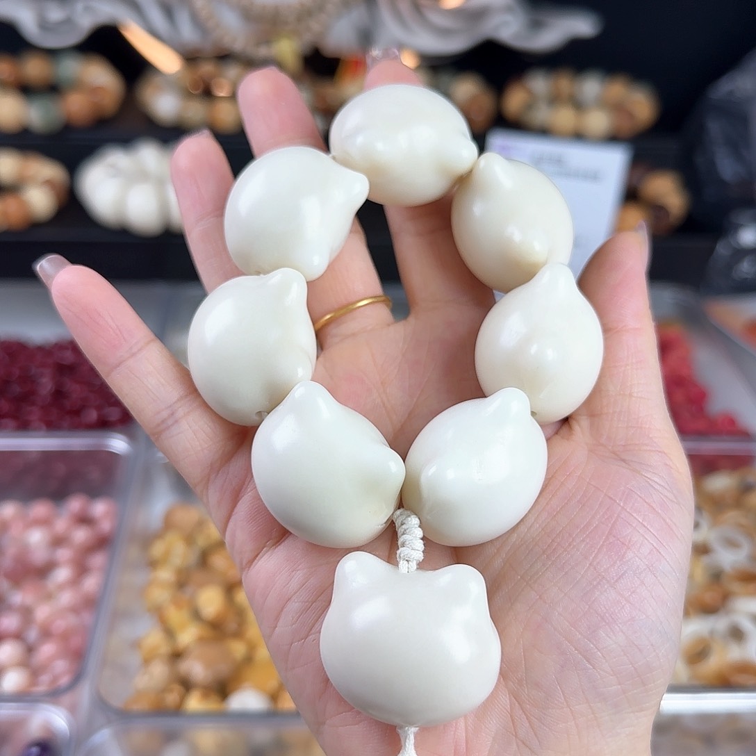 菩提根/象牙果吊坠堇**花瑕疵卡30猫头手捻1个孔道有裂