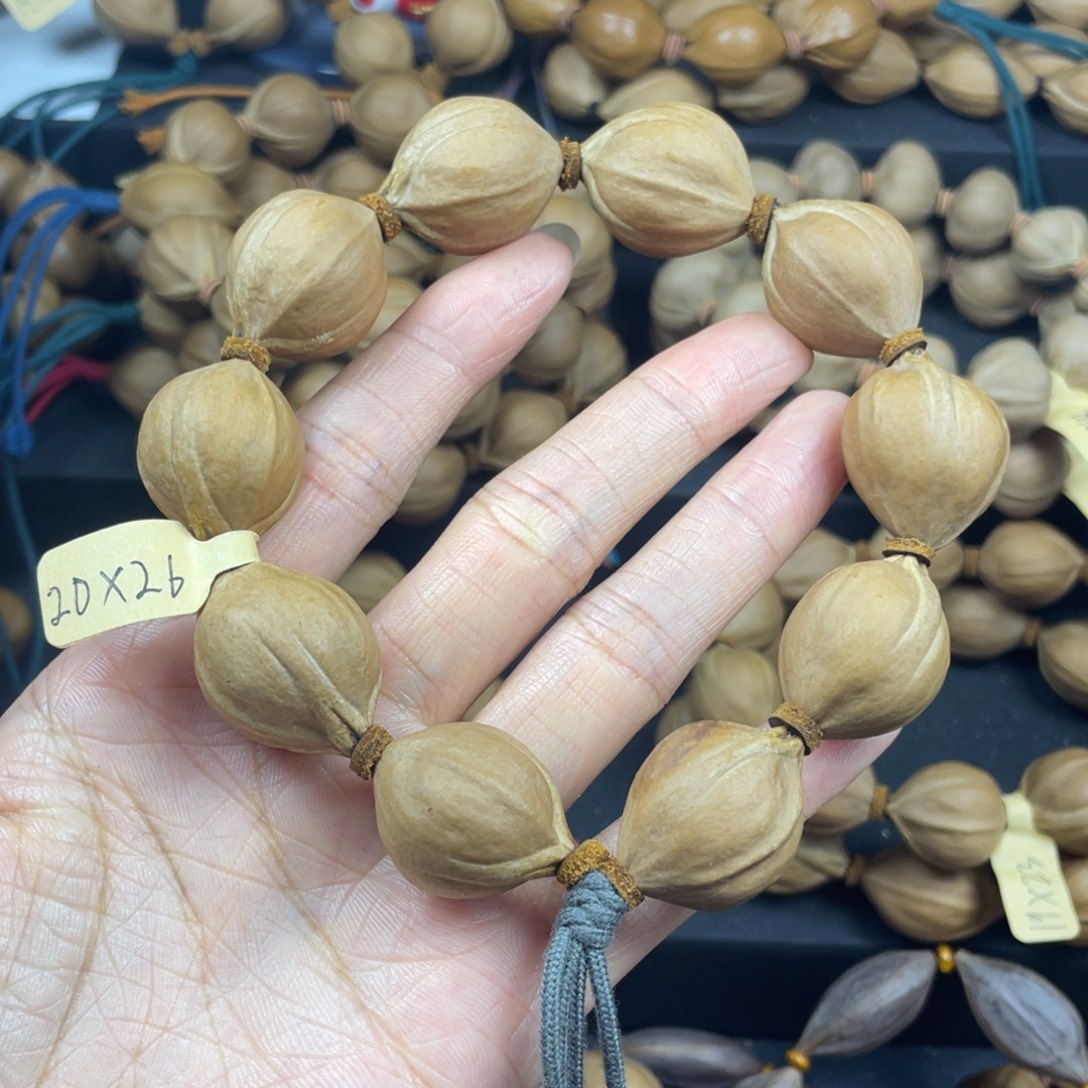 坦***然002橄榄核三花20*26