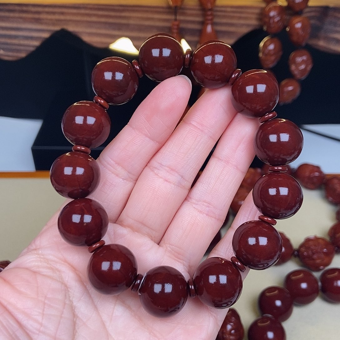 橄榄核吊坠小**师正圆光珠