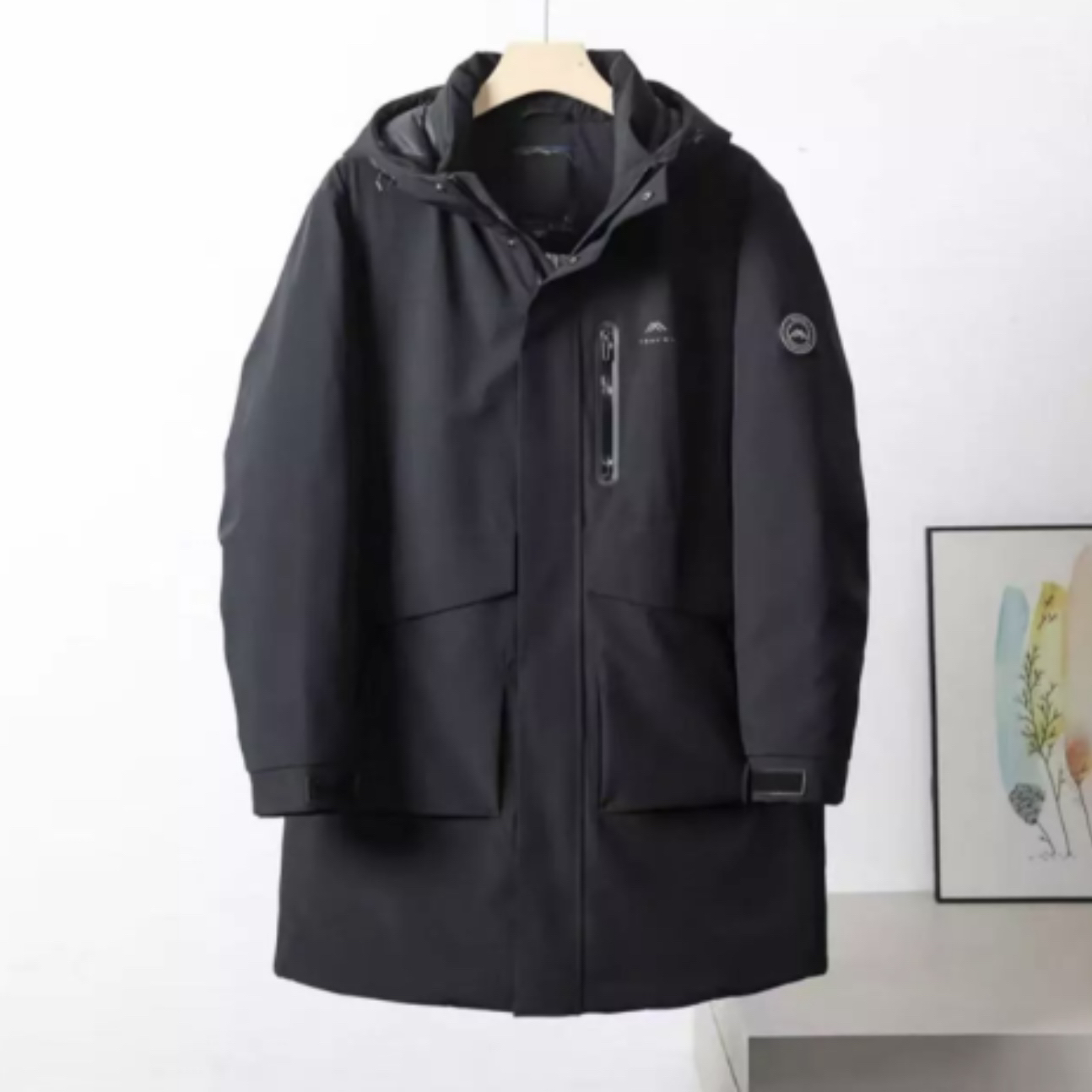 商场撤柜剪标中长款羽绒服