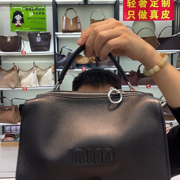 蚕丝牛皮真皮女包