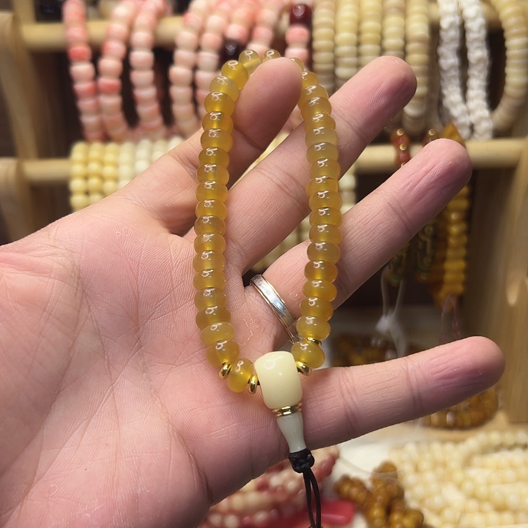 从***始把件桃核羊角单圈手持