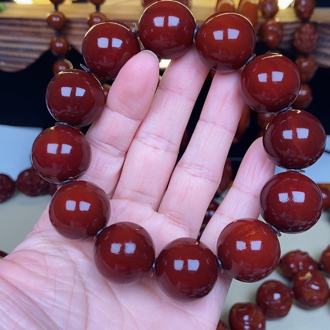 橄榄核吊坠期**来四花光珠