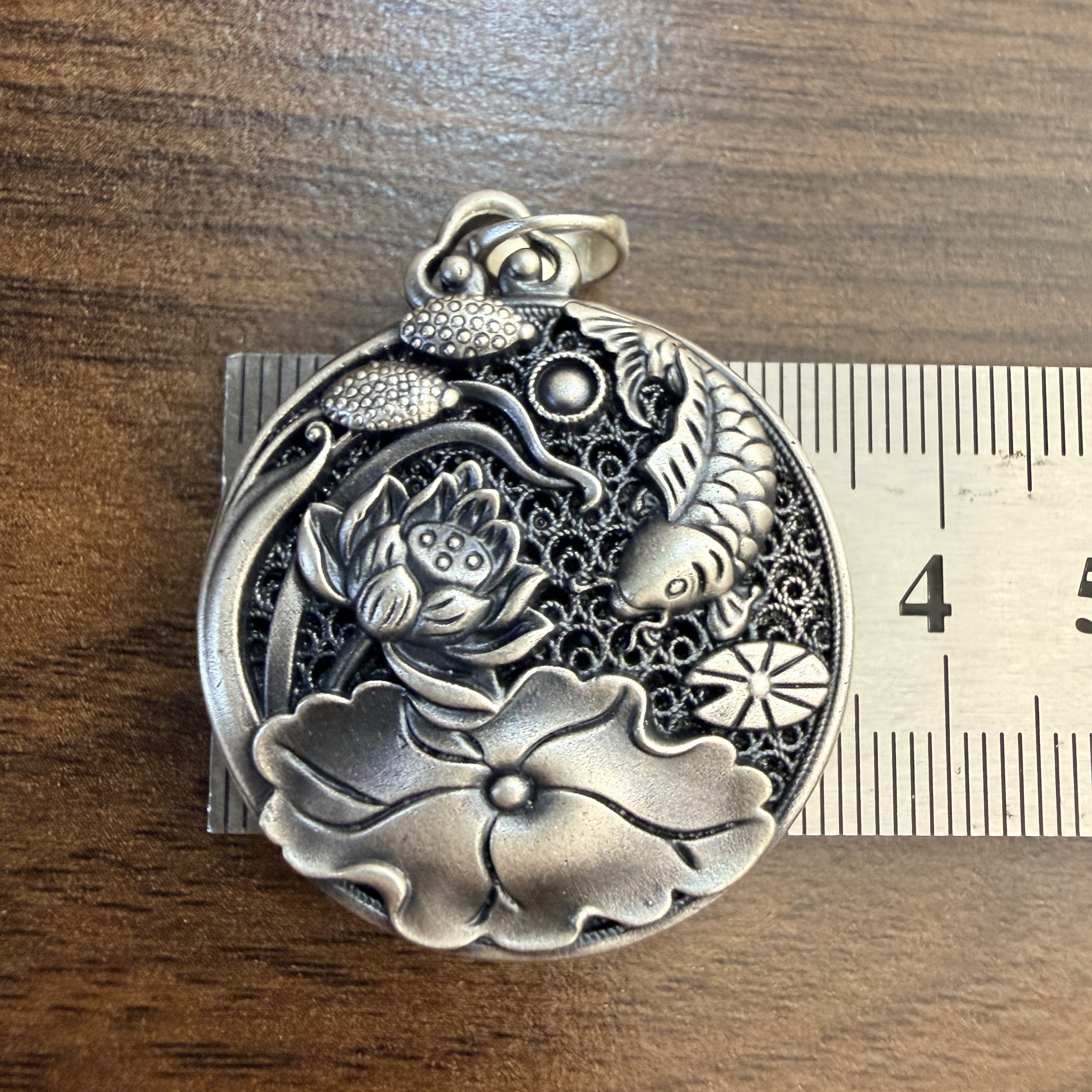 足银银制品 纯银吊坠，荷花鱼，999足银，复古镂空。16.5