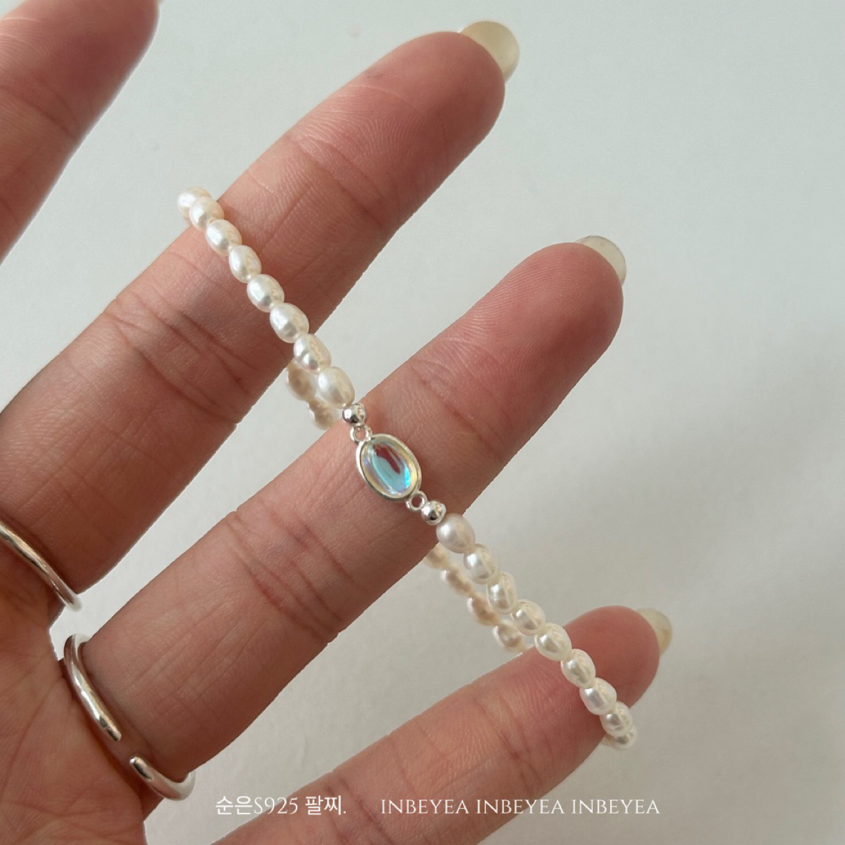 925银仿珍珠手链 椭圆弹力绳手链 银色  36105