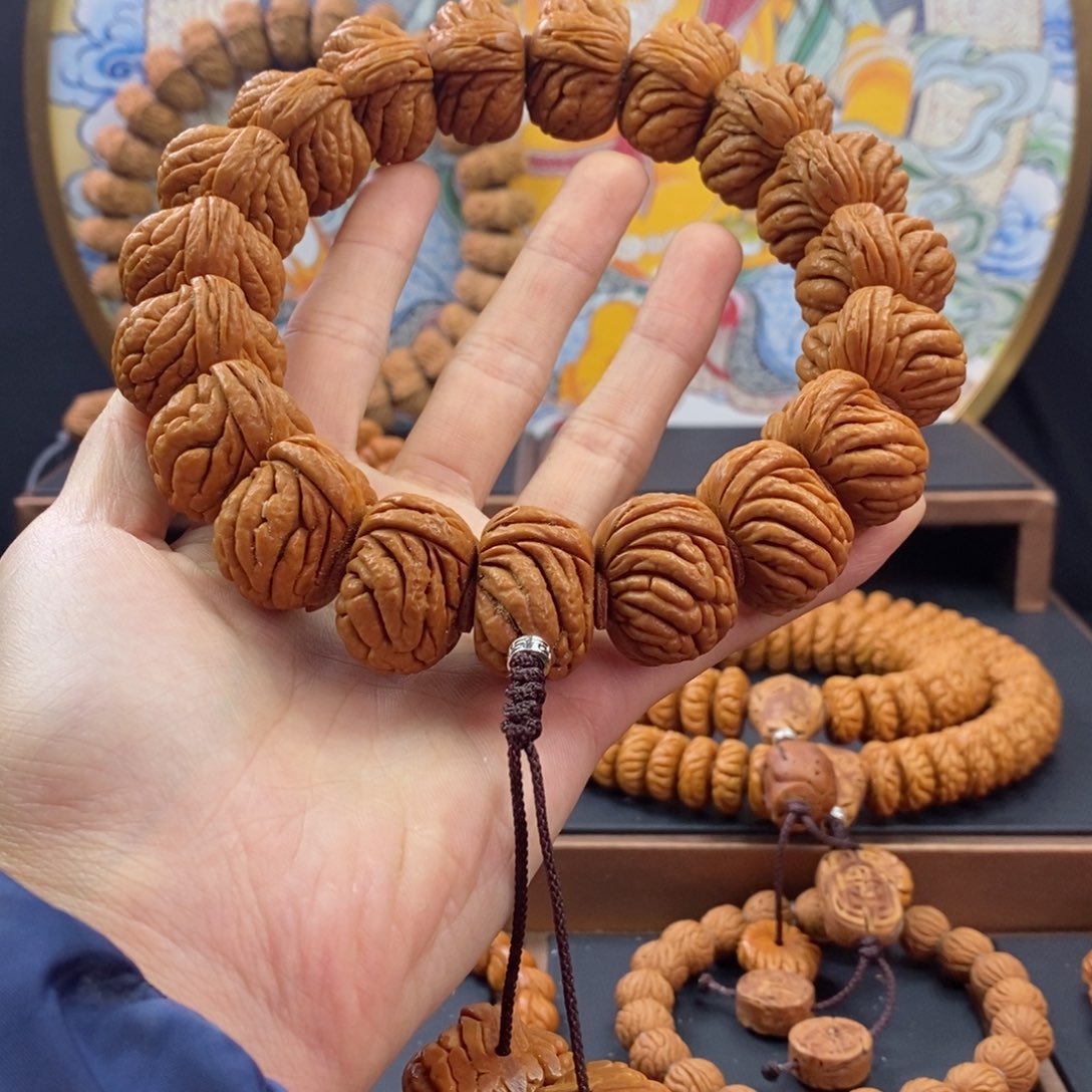 桃核手串龙纹桃核麒麟