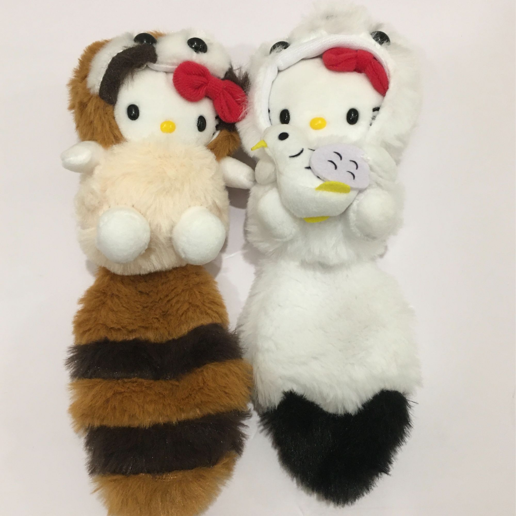 北海道限定大尾巴抱鸽子小浣熊Kitty包包挂件毛绒玩偶挂