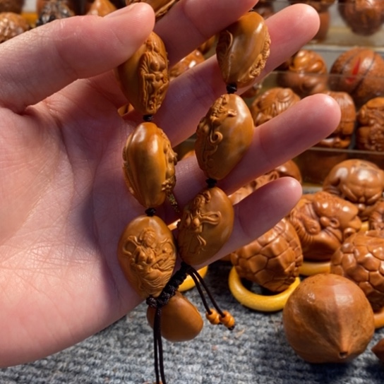 橄榄核吊坠西****鸡巴西橄榄