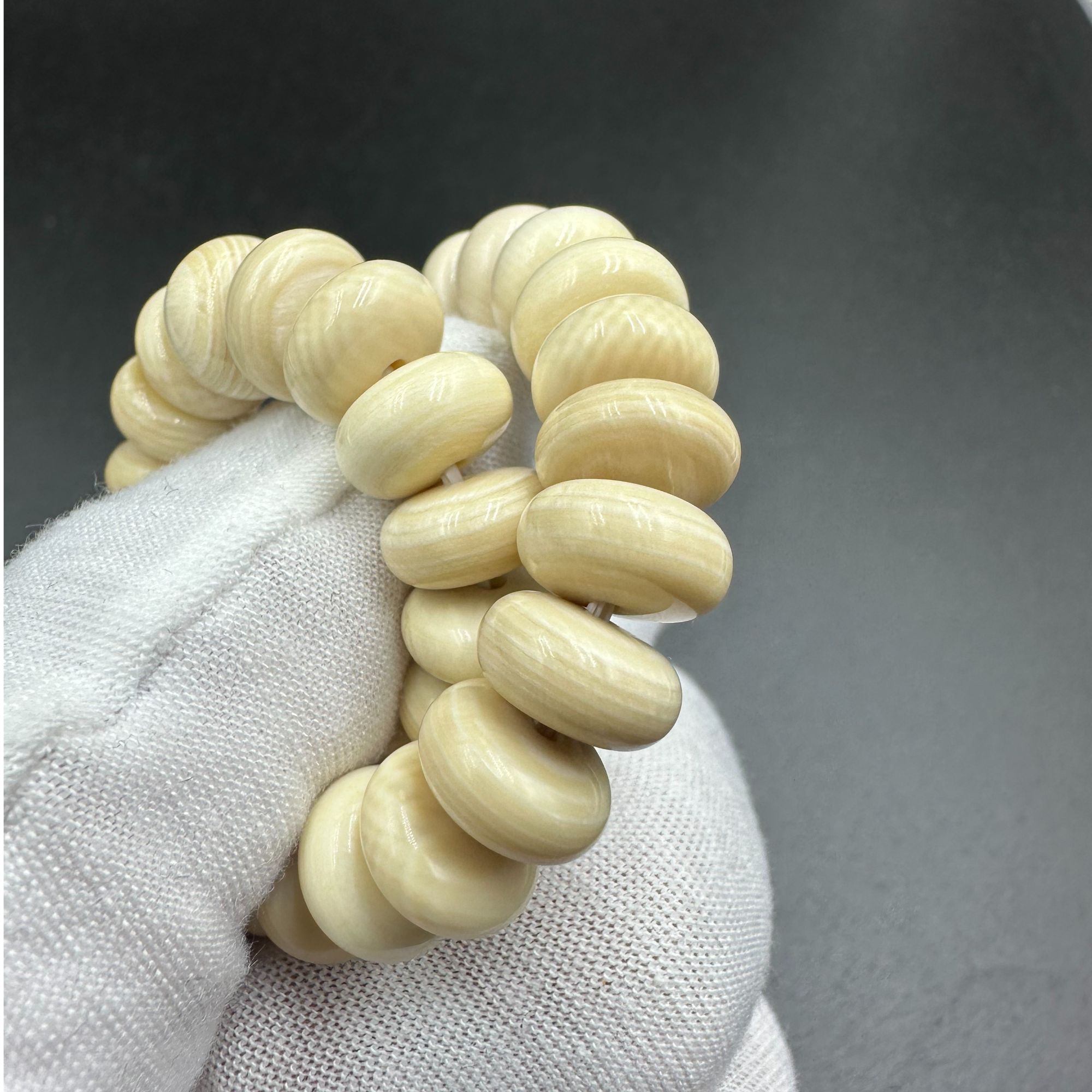 Y0101天然猛犸牙卡10单圈药片珠手串