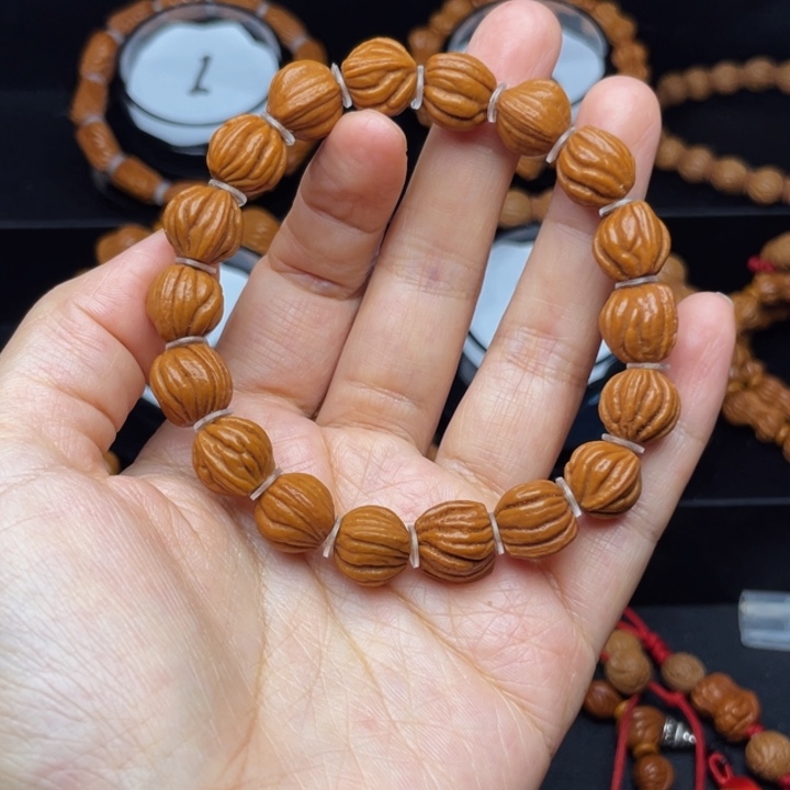 吊坠桃核佛手手串