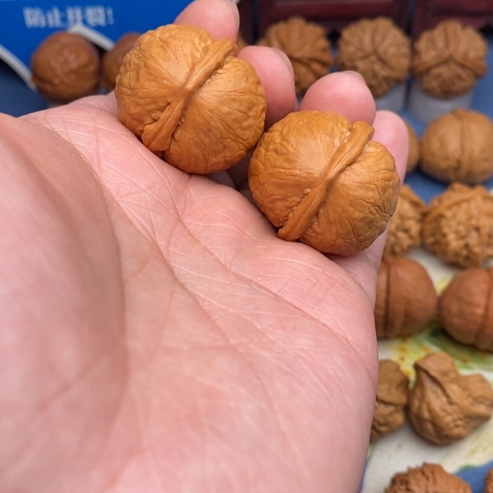 文玩核桃把件金佛