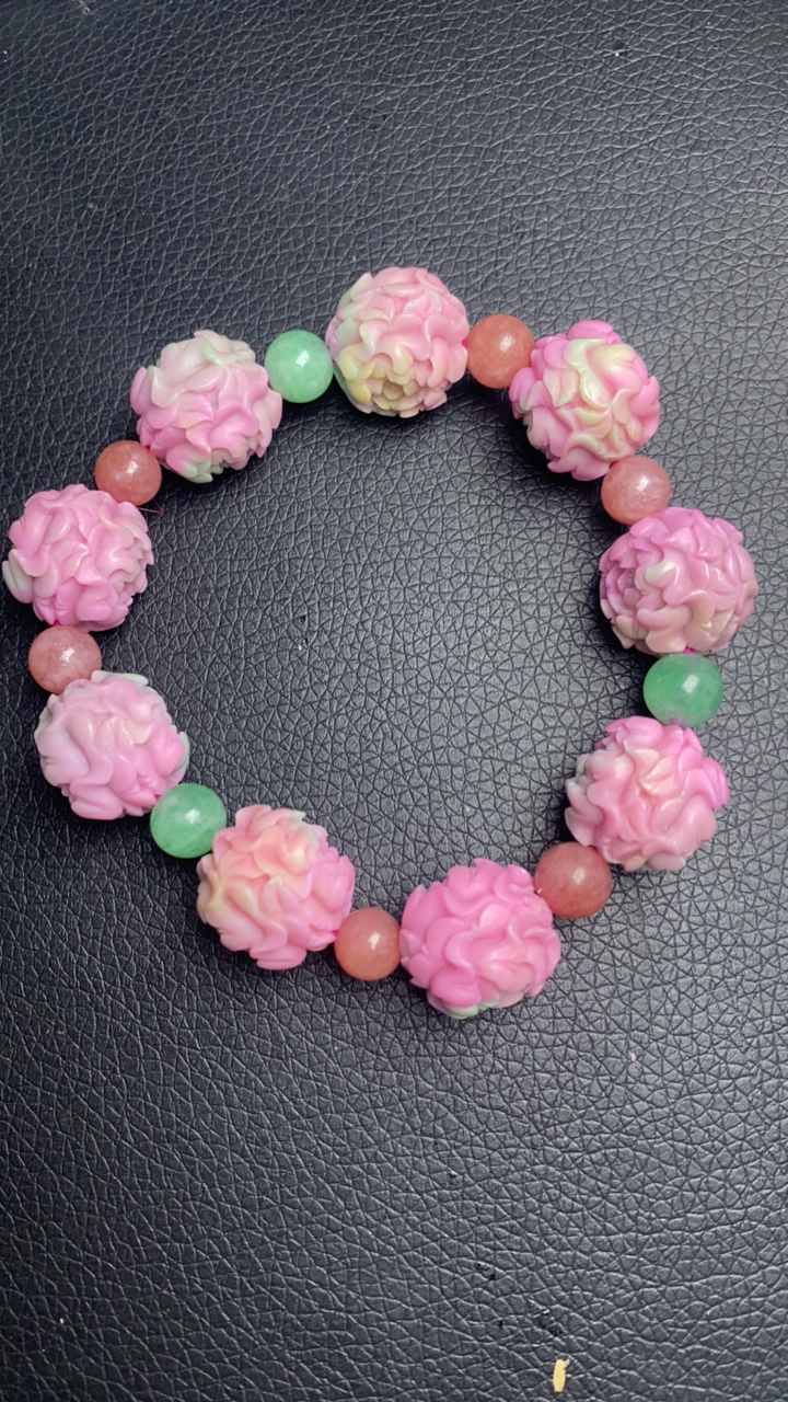 D 310 满雕凤穿牡丹玛瑙手串