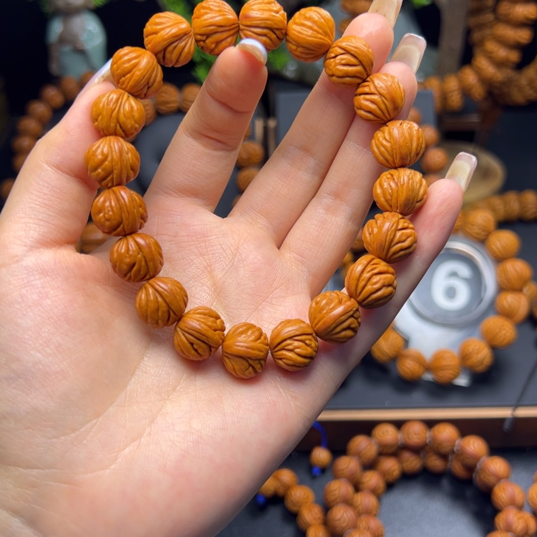 桃核手串凌****。火麒麟14手串