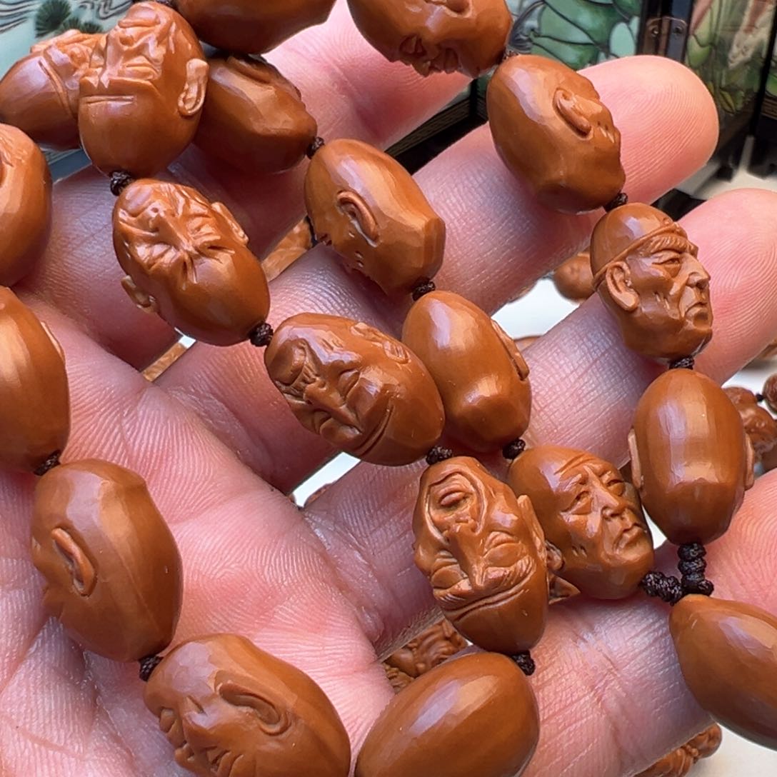 橄榄核吊坠十八罗汉手持
