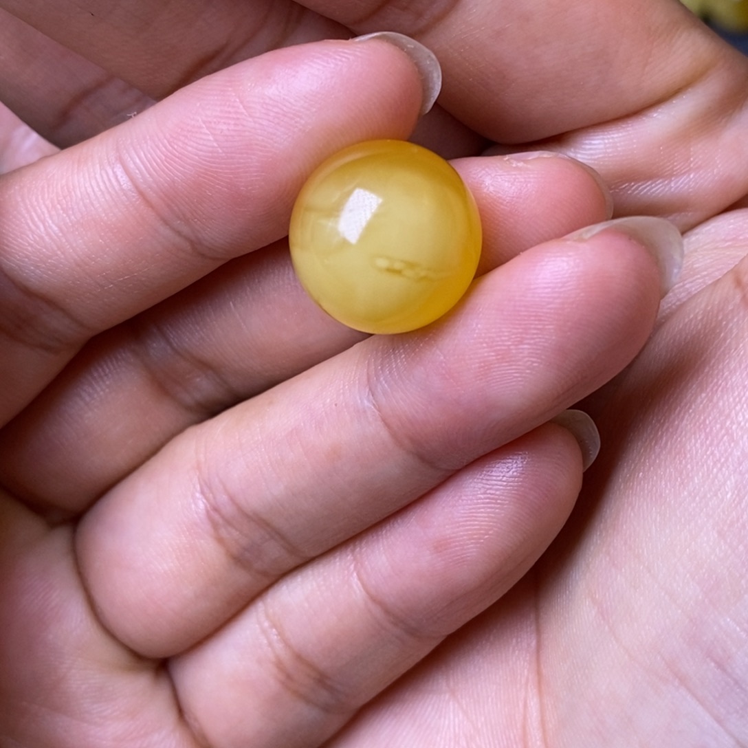 琥珀未镶嵌裸石黄白花圆珠