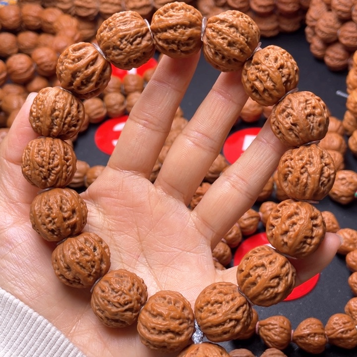 文玩核桃吊坠珊瑚黄皮手持