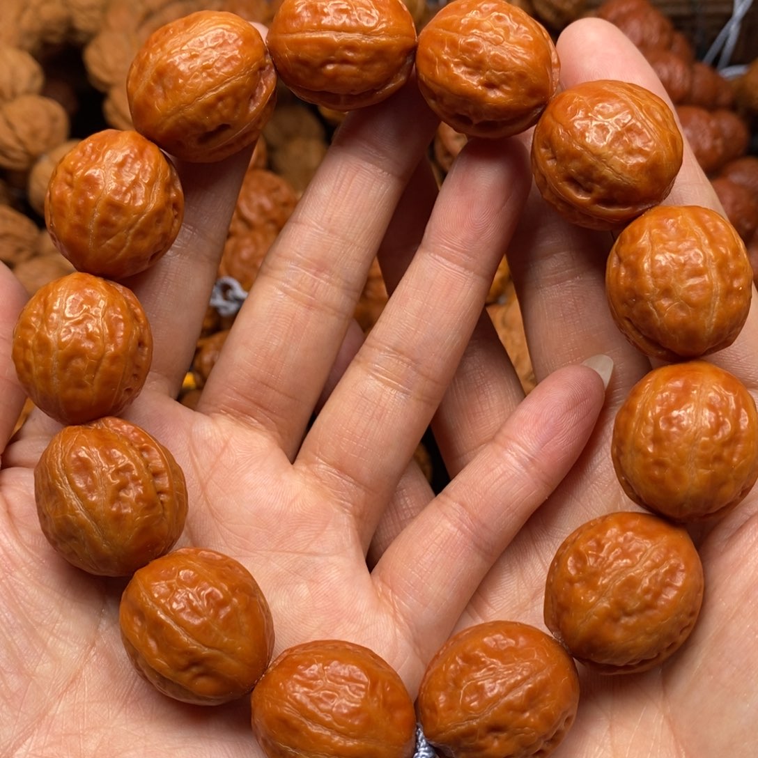 桃核手串光头富甲