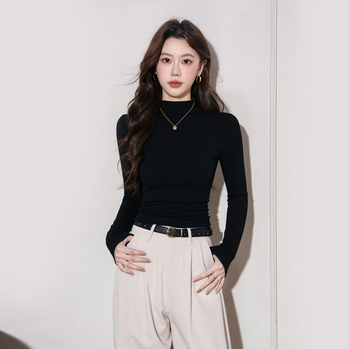 半高领褶皱长袖T恤女2025新款设计感收腰盖肚脐修身打底衫上衣