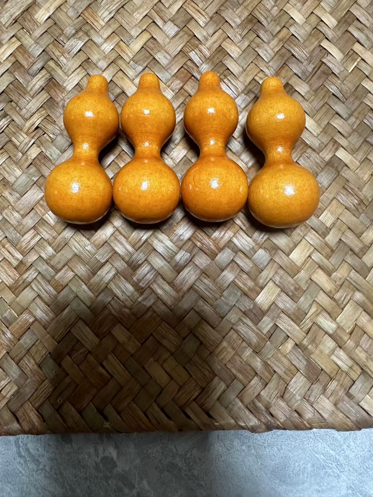 明丽-文玩桃木绕指4个一组【形状大小随机发货，不支持备注】