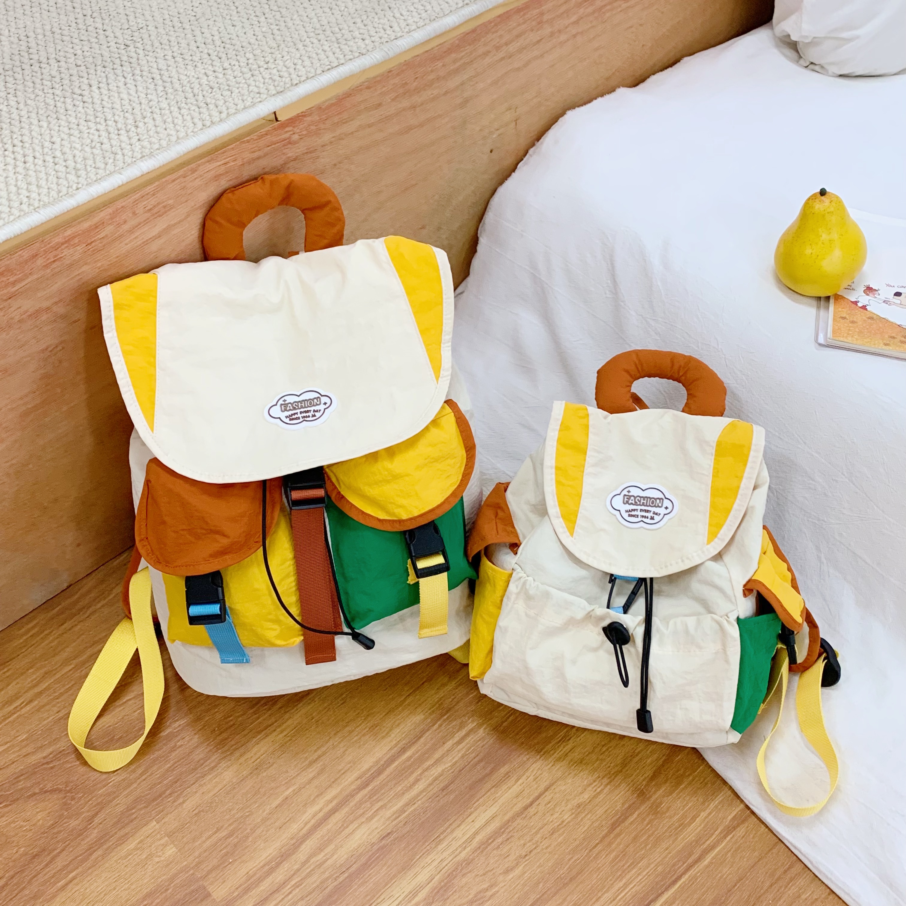 幼儿透气休闲旅行翻盖款车缝双肩包男女孩时尚少女轻便包包