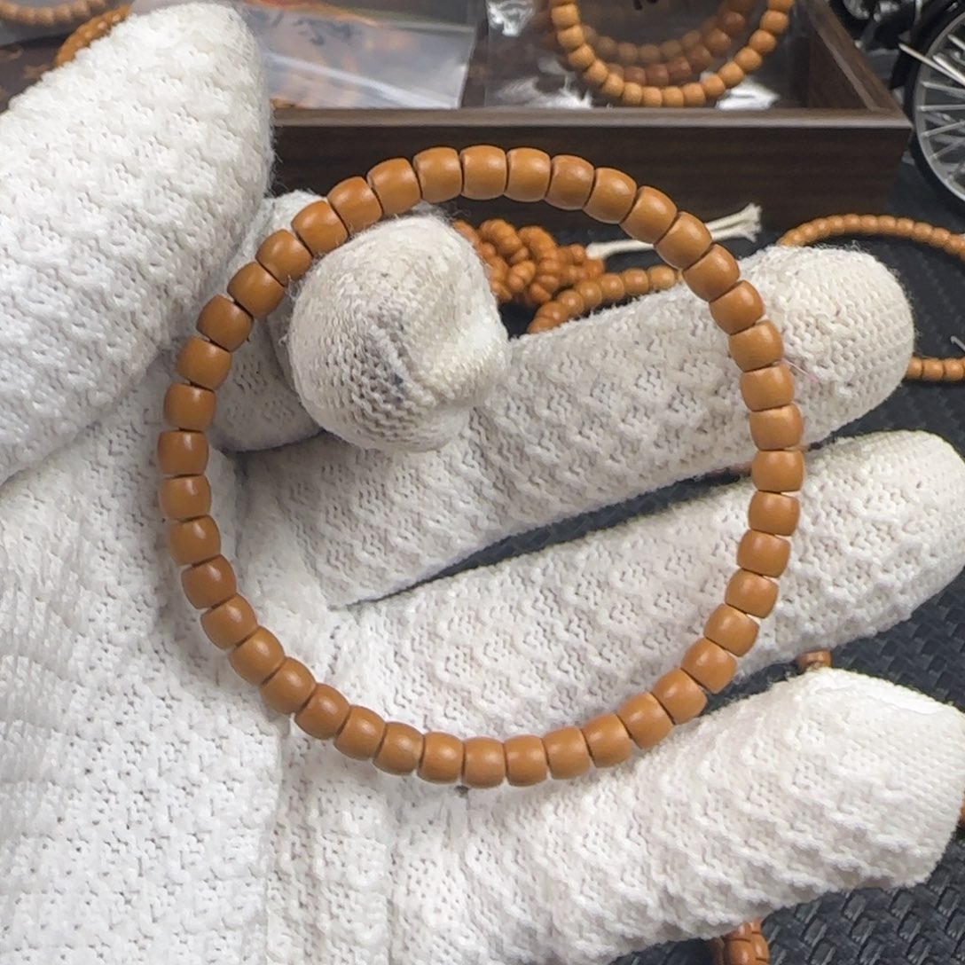 橄榄核吊坠5.4mm老挝核尖直切单圈颗颗三花