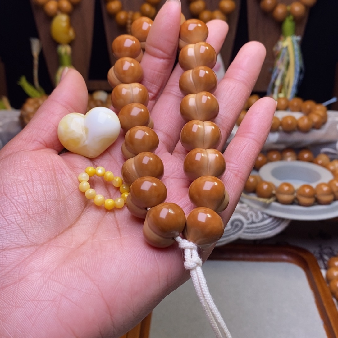 少***酱吊坠猴头核桃屁桃手持