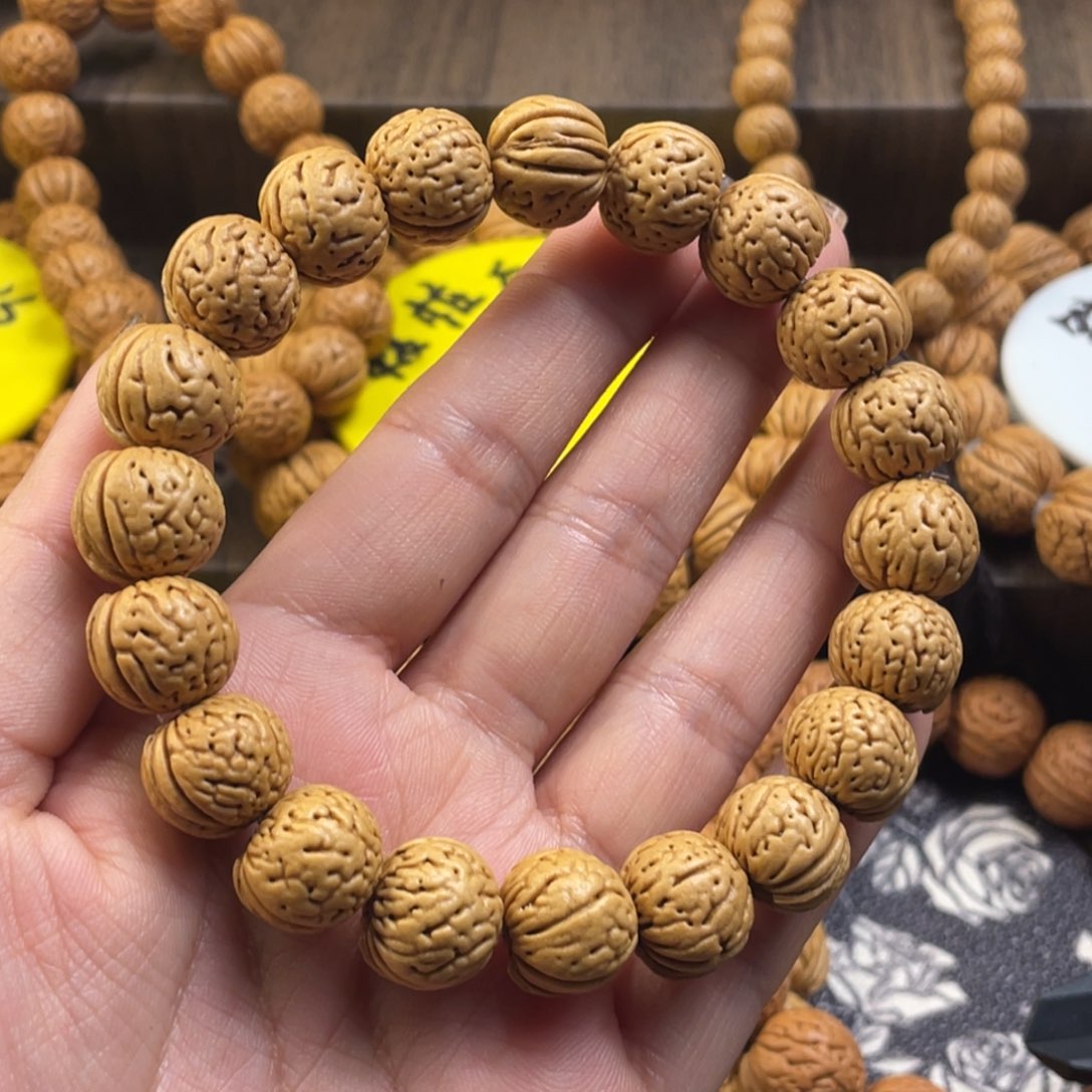 桃核手串昕****?野生金丹