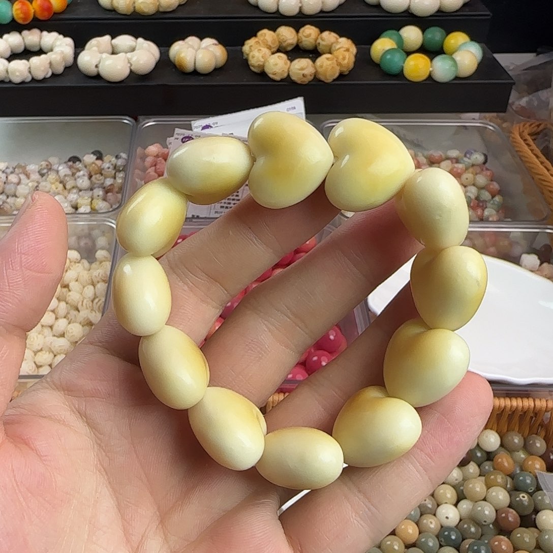 菩提根/象牙果手串微瑕疵炭烤爱心手串一条