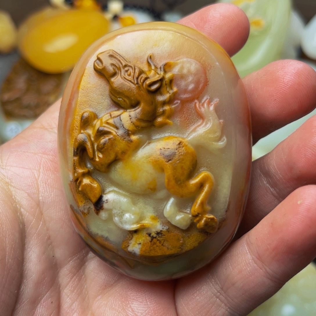 石材方解石手把件马