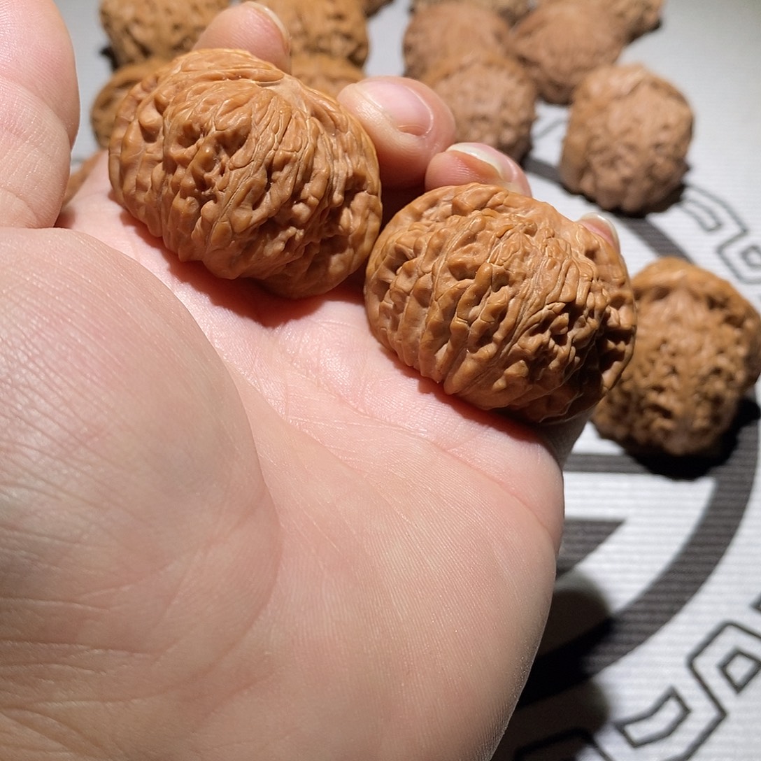 桃核吊坠四座楼文玩核桃手把件