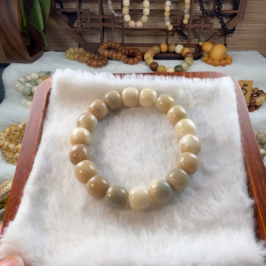 菩提根/象牙果手串奶咖色飘花